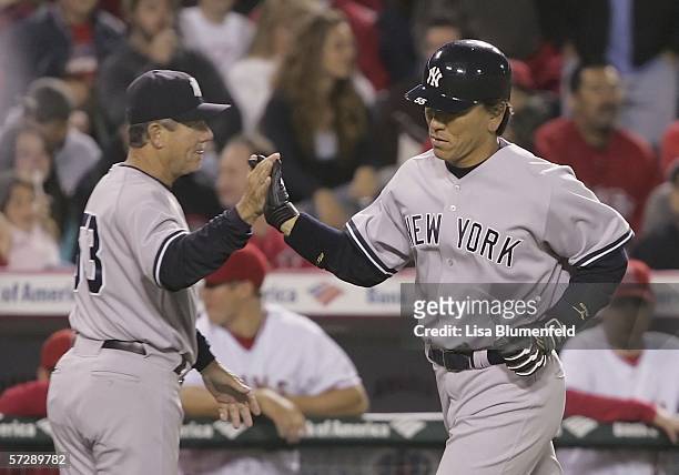 Hideki Matsui of the New York Yankees rounds the bases after hitting a homerun in the 9th inning against the Los Angeles Angels of Anaheim on April...