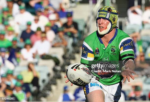 Alan Tongue of the Raiders passes during the round five NRL match between the Canberra Raiders and the Bulldogs played at Canberra Stadium on April...