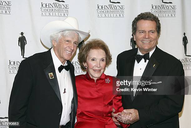 Honorees, actor/stuntman Dean Smith and Former First Lady Nancy Reagan and actor Patrick Wayne pose at the John Wayne Cancer Institute Auxiliary's...