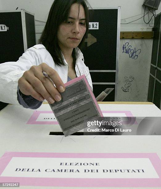 Woman casts her ballot at a polling station April 9, 2006 in Rome, Italy. About 47 million Italians are eligible to vote on April 9 and April 10 to...