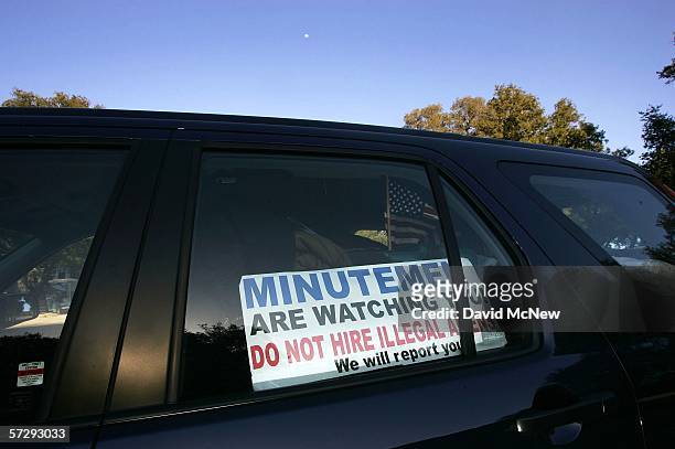 Sign in a volunteer's car gives a warning to employers of Illegal immigrants as the Minuteman Civil Defense Corps patrols the U.S.-Mexico border in...