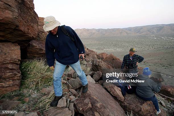 Minutemen Matt Sandt , Don Zaharee , and Bea Mitchell set up nighttime posts overlooking the border fence dividing the U.S. From Mexico as Minuteman...