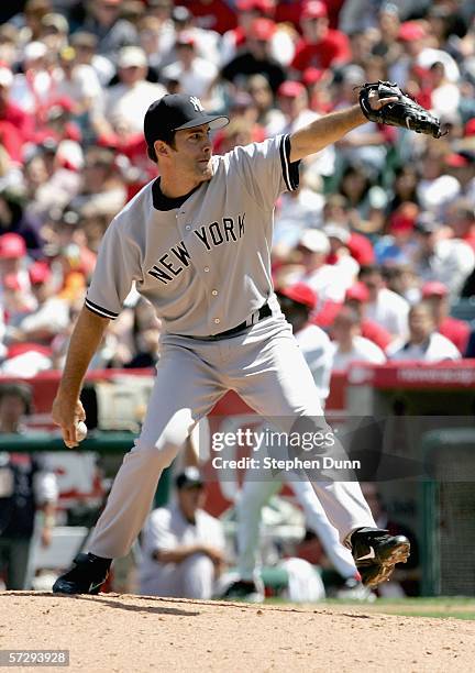 Mike Mussina of the New York Yankees throws a pitch against the Los Angeles Angels of Anaheim on April 9, 2006 at Angel Stadium in Anaheim,...