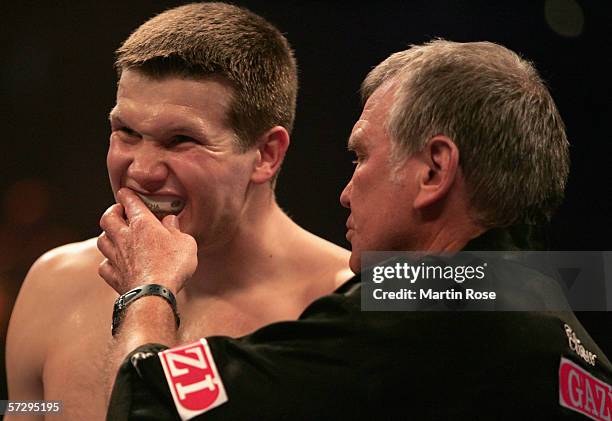 Fritz Sdunek and Alexander Dimitrenko of Ukraine seen in the corner during the WBO Heavyweight Intercontinental Championship fight between Alexander...