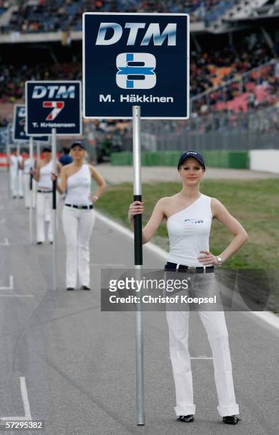 Grid Girls pose before the DTM 2006 German Touring Car Championship at the Hockenheim Circuit on April 9, 2006 in Hockenheim, Germany.