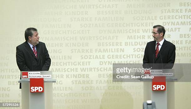 Matthias Platzeck and Kurt Beck, governor of the federal state of Rhineland-Palatinate, speak at a news conference during which Platzeck announced...