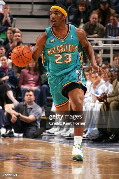 Smith of the New Orleans/Oklahoma City Hornets drives during a game against the Utah Jazz at the Delta Center on March 27, 2006 in Salt Lake City,...