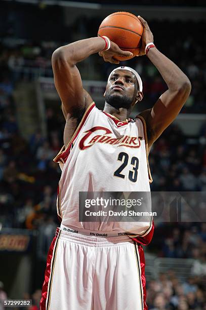 LeBron James of the Cleveland Cavaliers shoots a free throw against the Charlotte Bobcats during the game at Quicken Loans Arena on March 22, 2006 in...