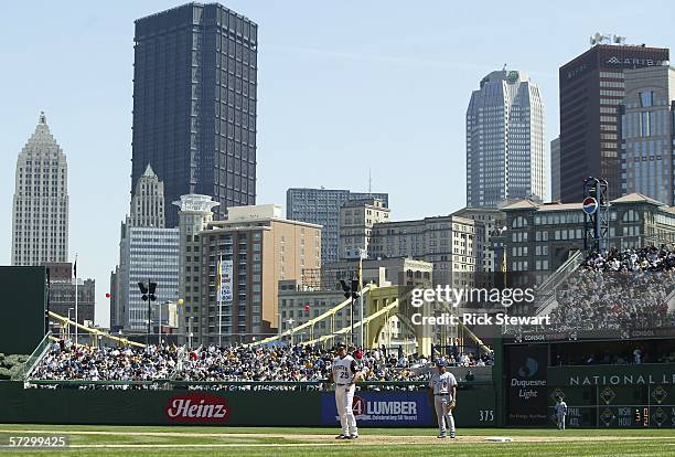 General view of the Pittsburgh skyline with Olmedo Saenz of the Los Angeles Dodgers and Sean Casey of the Pittsburgh Pirates on the field on April...