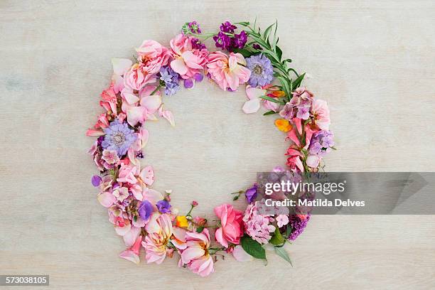 pretty pastel pink and purple flower wreath - floral wreath stock pictures, royalty-free photos & images