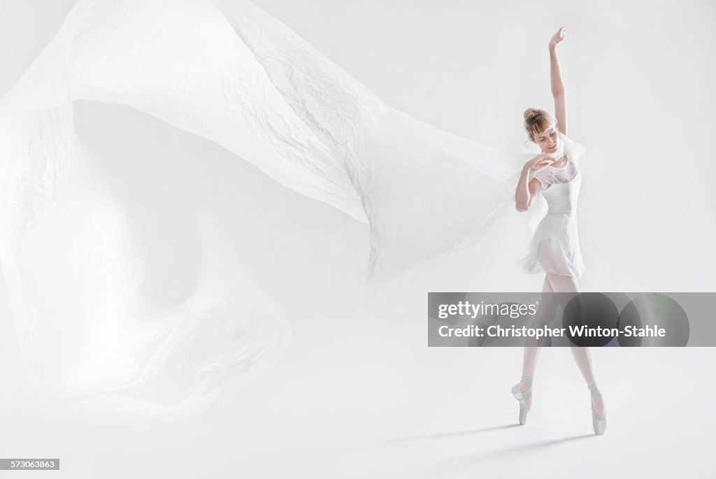 Caucasian ballet dancer dancing on pointe