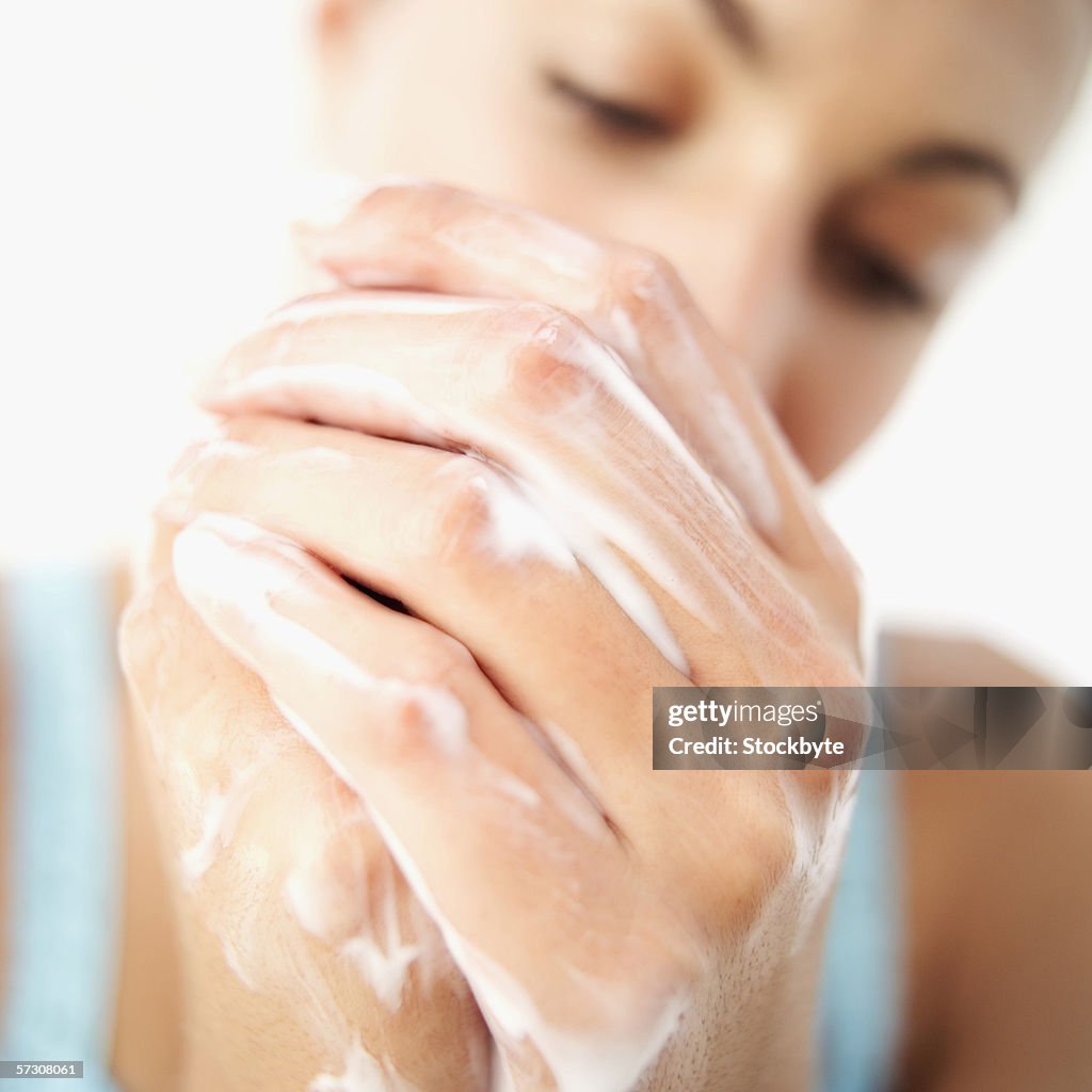 A Woman washing her hands
