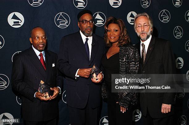 From left, Leon Huff, Kenny Gamble, Patti LaBelle, and Recording Academy President Neil Portnow pose backstage at the Recording Academy Honors 2006...