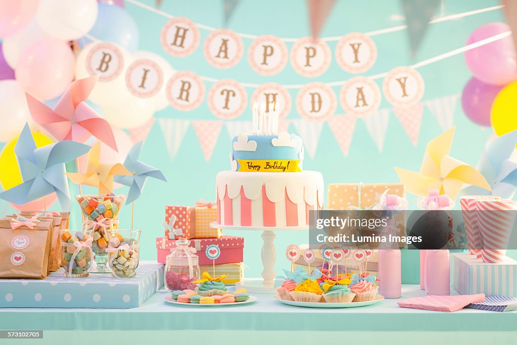 Cake, candy and gifts at birthday party