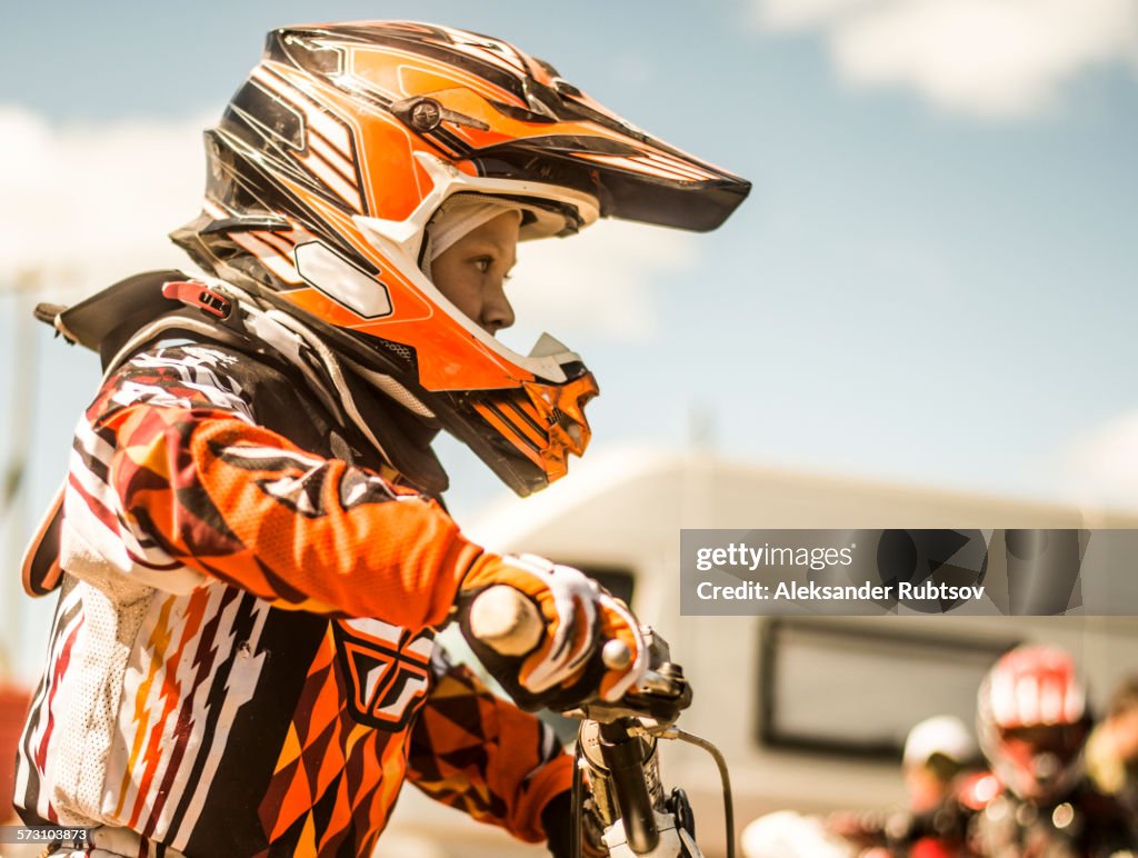 Caucasian motocross biker ready for race