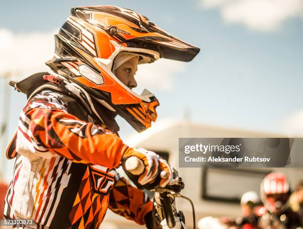 caucasian motocross biker ready for race - motorcross stock pictures, royalty-free photos & images