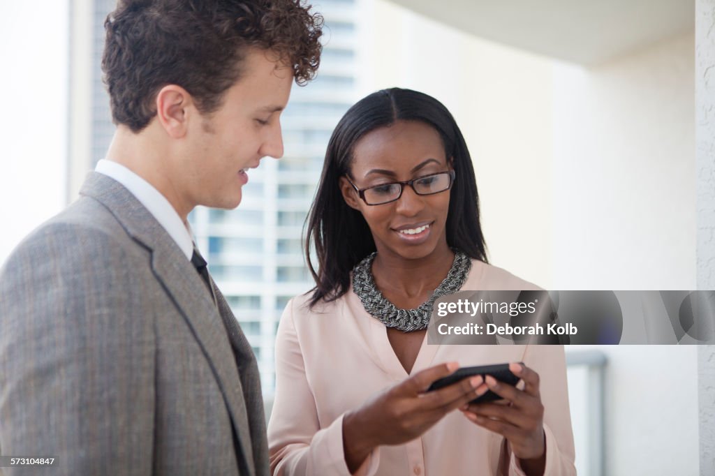 People Using Work Phone Business People Using Cell Phone In Office High-Res Stock Photo - Getty ...