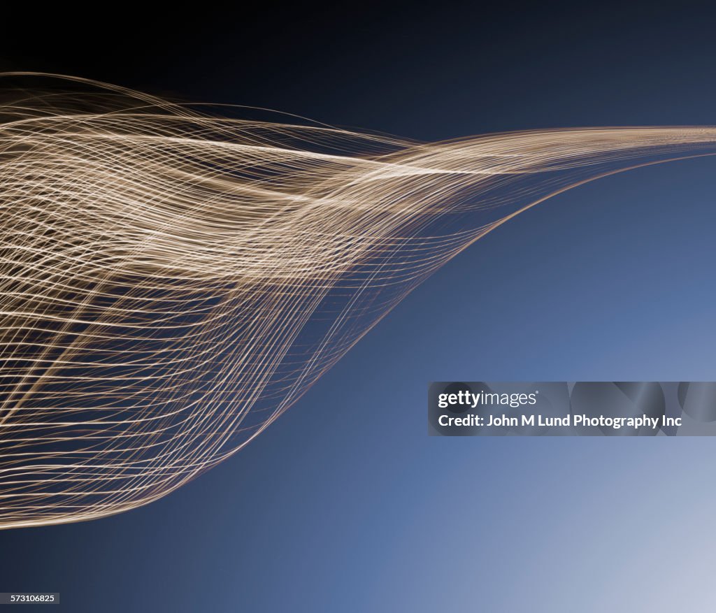 Light streams flowing over gradient background