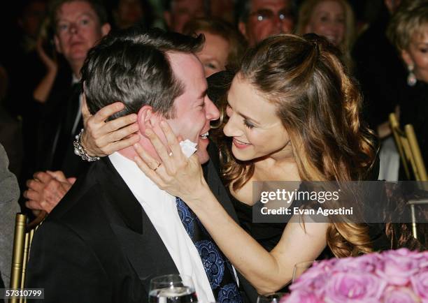 Actress Sarah Jessica Parker kisses husband Matthew Broderick after singing for him during the American Theatre Wing Annual Spring Gala at Cipriani...