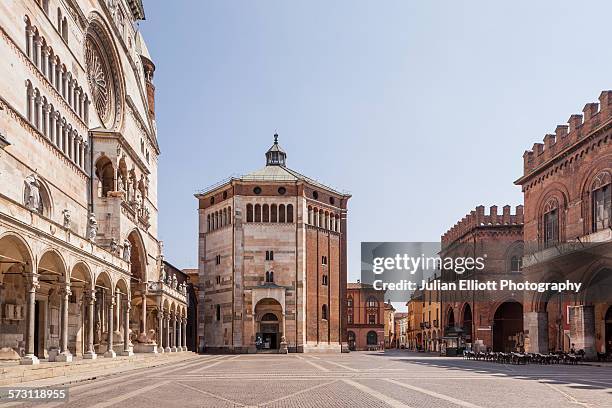 the duomo di cremona and the baptistery. - cremona stock pictures, royalty-free photos & images