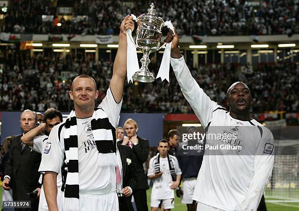 Lee Trundle and Adebayo Akinfenwa of Swansea City celebrate after their victory during The Football League Trophy Final match between Carlisle United...