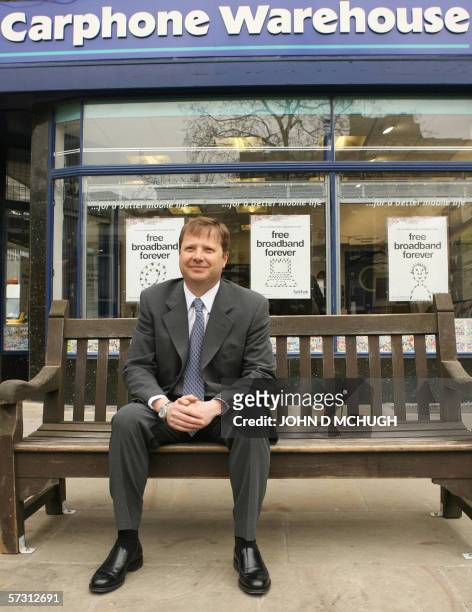 United Kingdom: Carphone Warehouse Chief Executive Charles Dunstone is pictured outside one of his stores in London, 11 April 2006. Carphone...