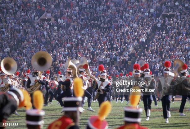 Members of the University of Arizona marching band perform on the field during the halftime show at Super Bowl One between the Kansas City Chiefs and...