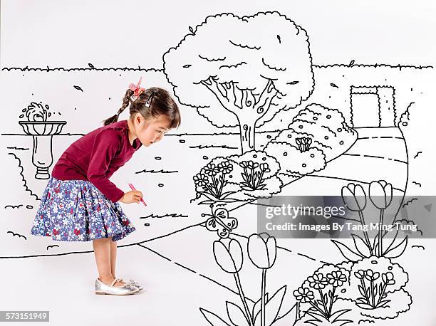 little girl drawing a park on white background - draw a butterfly stock pictures, royalty-free photos & images