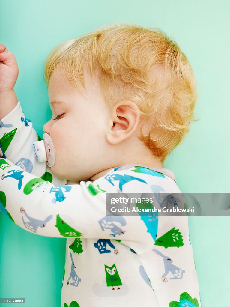 Baby Sleeping on Side with Pacifier