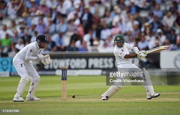Asad Shafiq of Pakistan batting as Jonny Bairstow of England looks on at Lord's Cricket Ground on July 14, 2016 in London, England.