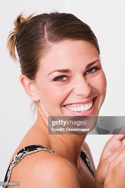 portrait of a young woman smiling - hair part stock pictures, royalty-free photos & images