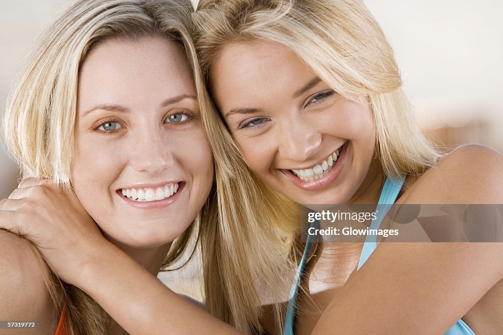 Portrait of two young women smiling