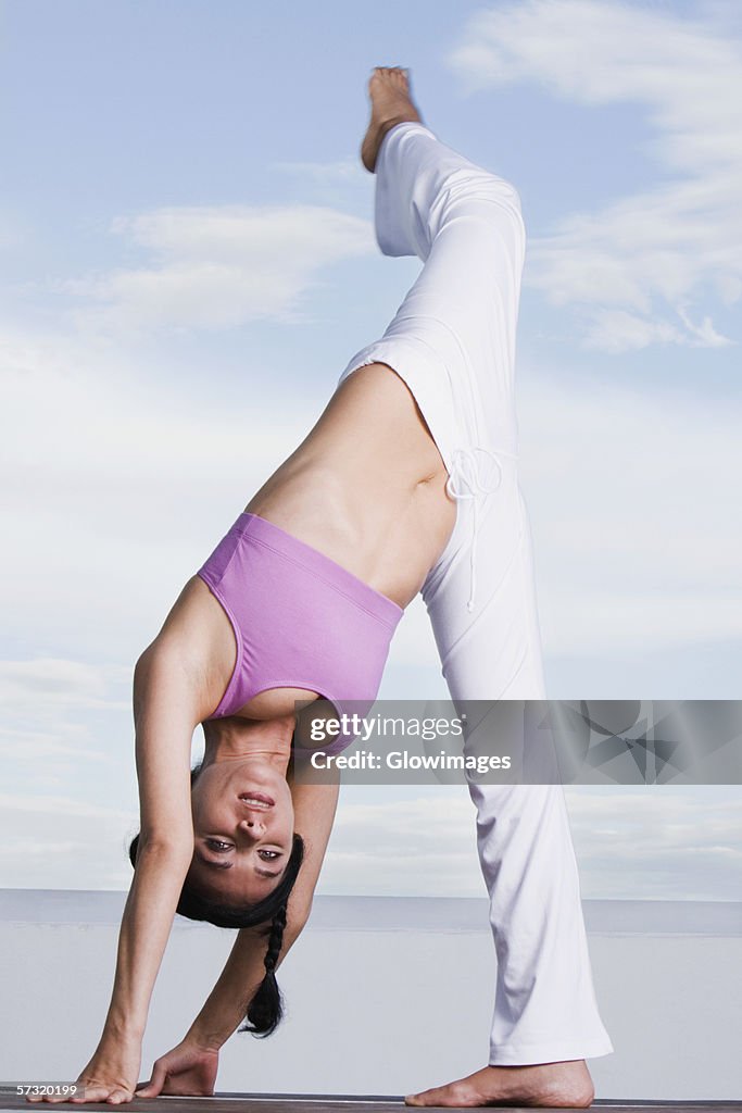 Portrait of a young woman exercising