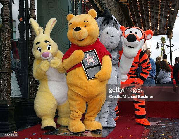 Rabbit, Winnie The Pooh, Eeyore and Tigger pose for photos as Winnie The Pooh receives a star on the Hollywood Walk of Fame in front of the El...