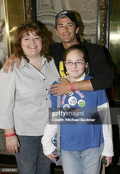 Actor Luke Perry arrives with family members Marcie and Amy Coder at the screening of Pooh's Grand Adventure - The Search for Christopher Robin at...