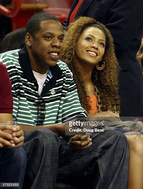 Rapper/producer Jay-Z and singer Beyonce Knowles attend a game between the Toronto Raptors and the Miami Heat on April 11, 2006 at American Airlines...