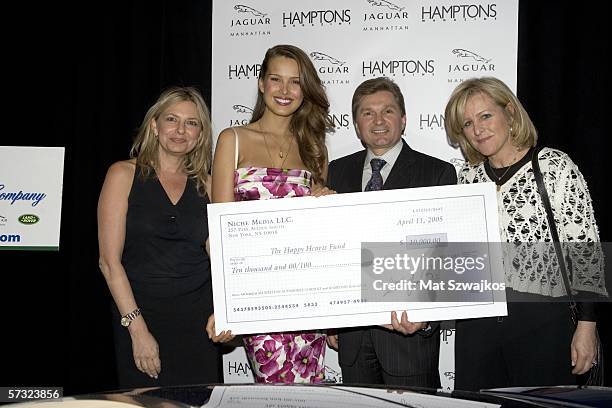 Publisher of Hampton's Magazine, Debra Halpert, model Petra Nemcova, Gary Flom of Jaguar and Niche group publisher, Laurie Burgess pose after...