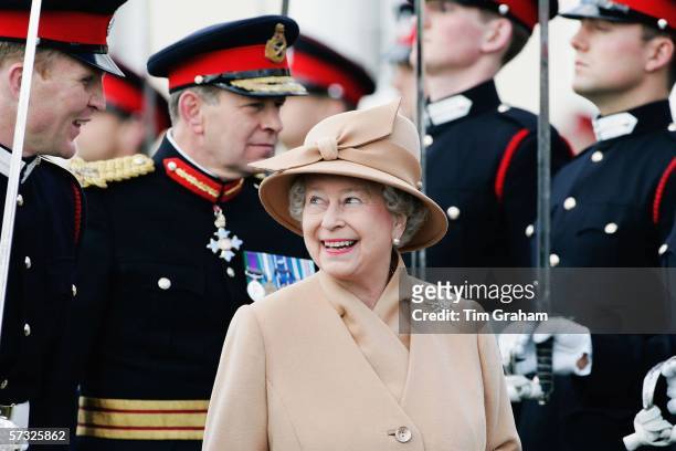 Queen Elizabeth II inspects soldiers at their passing-out Sovereign's Parade at Sandhurst Military Academy on April 12, 2006 in Surrey, England.