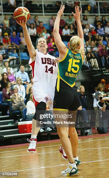 Katie Smith of the USA drives to the basket as Lauren Jackson of Australia blocks during the Opals World Challenge match between Australia and the...