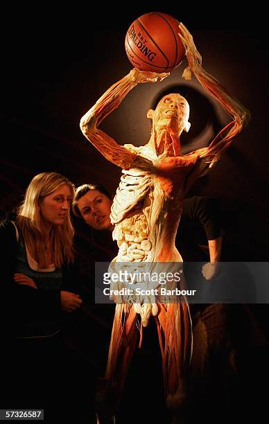 Two woman examine a body specimen during the Bodies.....The Exhibition on April 12, 2006 in London, England. The exhibition gives the public the...