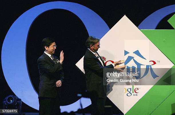 Google chief executive Eric Schmidt and Vice President, Engineering and President of Google China Kai-Fu Lee spell Chinese characters "Gu Ge" at the...