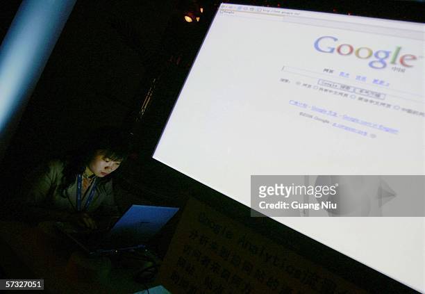 Visitor looks at Google website in a laptop during Google global Chinese name launch ceremony April 12, 2006 in Beijing, China. Google said it has...