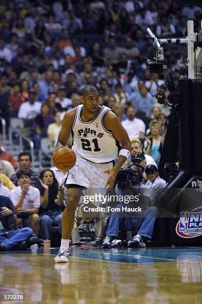 Tim Duncan of the San Antonio Spurs in action against the Dallas Mavericks in game five of the western conference semi-finals at the Alamodome in San...