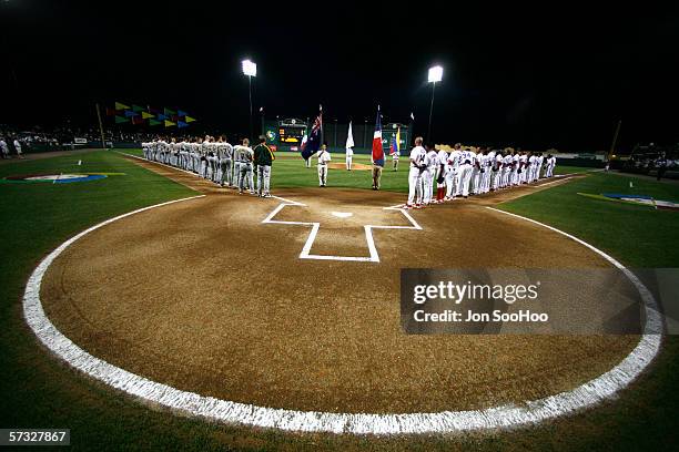 Members of the Dominican Republic and Australia line up on March 10, 2006 at The Ballpark at Disney's Wide World of Sports in Kissimmee, Florida....