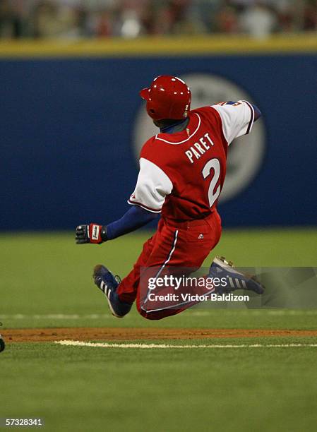 Eduardo Perez of Cuba slides against Puerto Rico on March 15, 2006 at Hiram Bithorn Stadium in San Juan, Puerto Rico. Cuba defeated Puerto Rico 4-3.