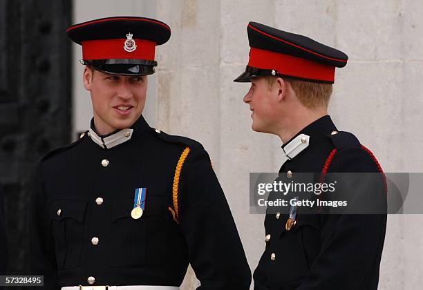 Prince William and Prince Harry looks on at the passing-out Sovereign's Parade at Sandhurst Military Academy on April 12, 2006 in Sandhurst, England.