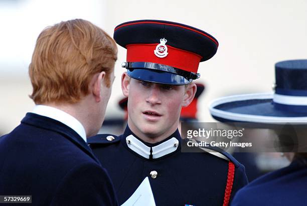 Prince Harry talks to Mark Dyer at his passing-out Sovereign's Parade at Sandhurst Military Academy on April 12, 2006 in Sandhurst, England.