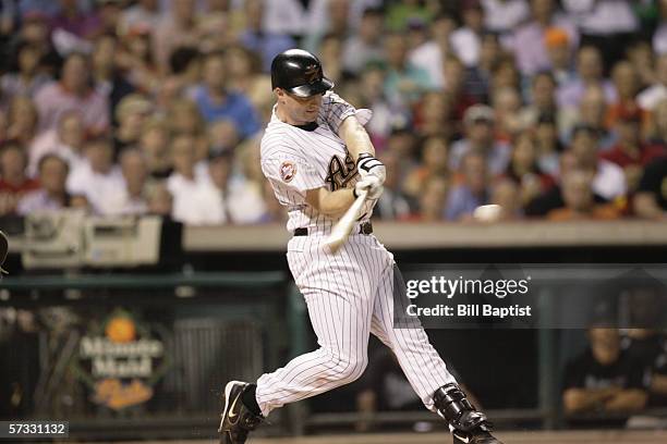 Morgan Ensberg of the Houston Astros bats against the Florida Marlins during the Opening Day game at Minute Maid Park on April 3, 2006 in Houston,...