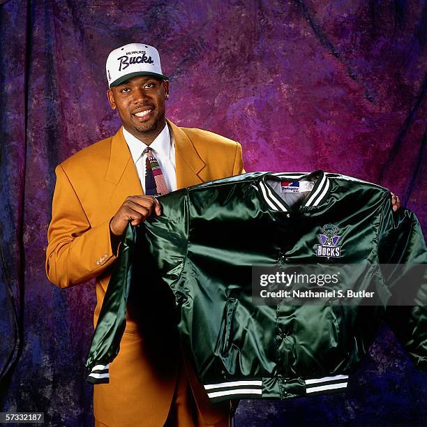 Glenn Robinson poses for the camera after being selected number one overall by the Milwaukee Bucks at the 1994 NBA Draft held June 29, 1994 in...