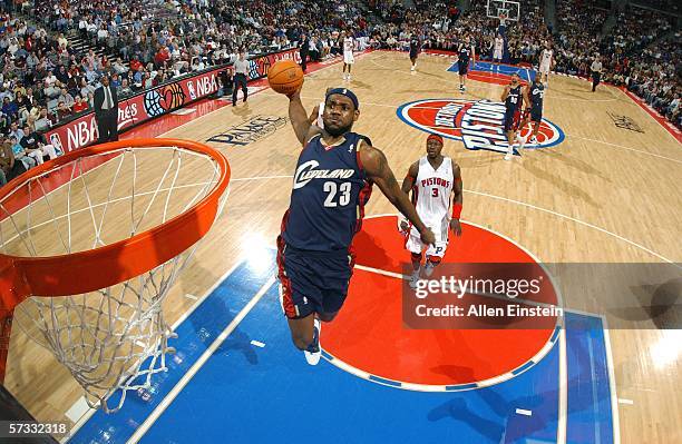 LeBron James of the Cleveland Cavaliers dunks in a game against the Detroit Pistons on April 12, 2006 at the Palace of Auburn Hills in Auburn Hills,...